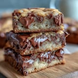 Cadbury Egg Blondies with White Chocolate Drizzle: chewy golden bars studded with Cadbury Mini Eggs and finished with a glossy white chocolate drizzle.
