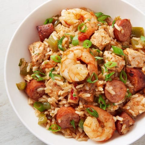 Flavorful Jambalaya, a comforting one-pot meal with savory andouille sausage and tender chicken.